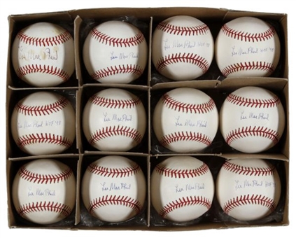 Lot of (12) Lee MacPhail Single-Signed Official American League Baseballs